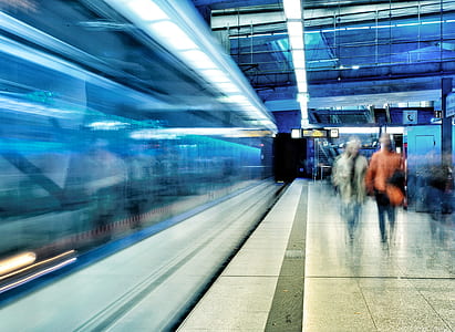 tanning photography of white train on subway thumbnail