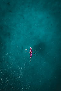 top view of boat on body of water thumbnail