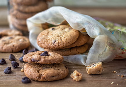 chocolate chip cookies on wooden surface thumbnail