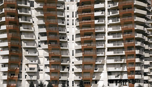 white-and-brown high-rise buildings thumbnail