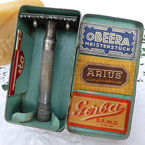 g gray metal rod with teal case thumbnail