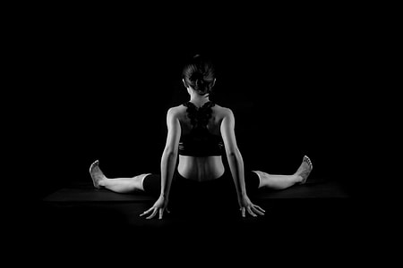 woman in black bottoms doing yoga thumbnail