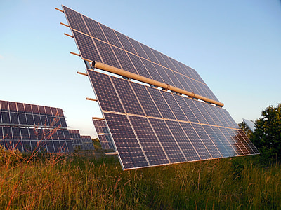 solar panel surrounded with green grass thumbnail