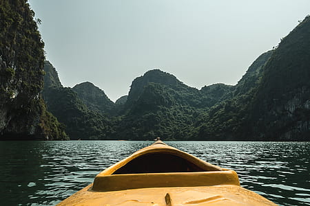 landscape photography of mountains near body of water thumbnail