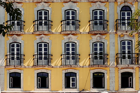 yellow and white 3-storey house thumbnail