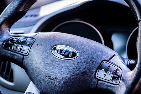 black Kia car steering wheel thumbnail