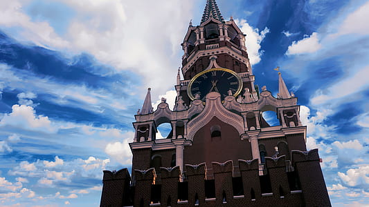 clock tower under cloudy sky thumbnail