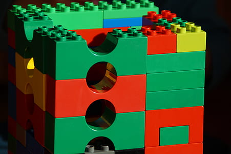 red, green, and yellow plastic toy blocks thumbnail