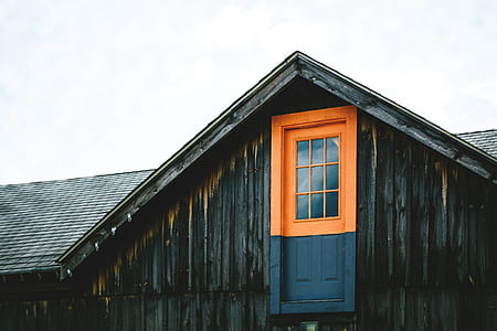 black wooden house under white sky thumbnail