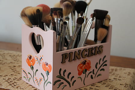 pink floral wooden rack filled with make-up brush lot thumbnail