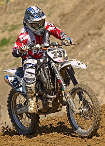 Man Riding Off Road Motorcycle on Trail thumbnail