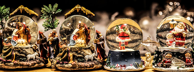 four Santa Claus snow globes thumbnail