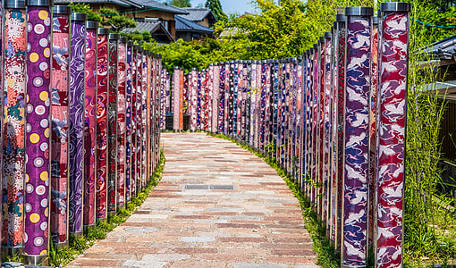pathway surrounded by glass poles thumbnail