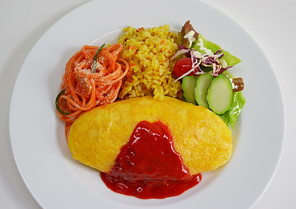 omelet beside pasta and stir rice thumbnail