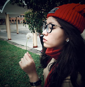 Woman Wearing Red Beanie Cap thumbnail