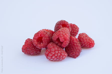 raspberry fruits on white surface thumbnail