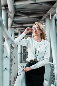 woman standing on bridge thumbnail