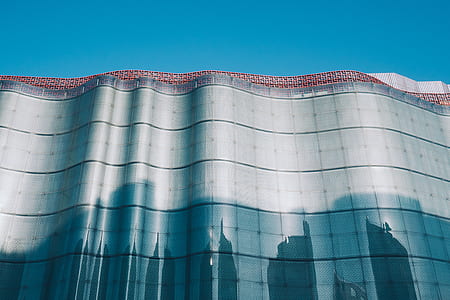 photo of high rise building during daytime thumbnail