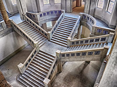 brown wooden cross-formed stairways inside room thumbnail