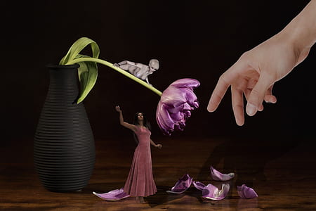 woman in red dress standing under purple flower painting thumbnail