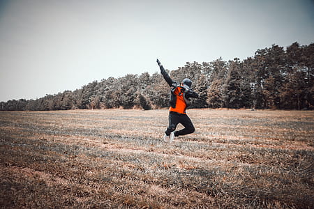 Person Jumping over Grass thumbnail