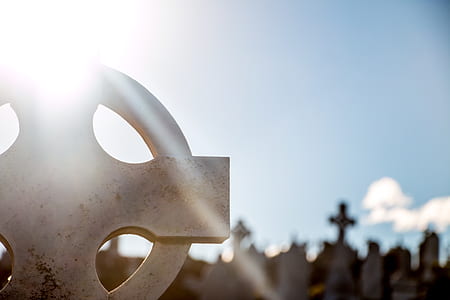 close up photography of cross tombstone thumbnail