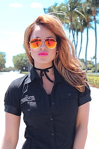 woman wearing black button-up shirt with sunglasses thumbnail