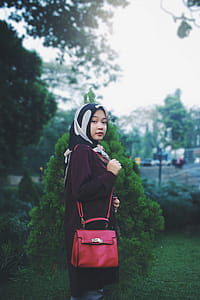 Woman Holding Her Purse thumbnail