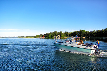 white bowrider on sea during daytime thumbnail