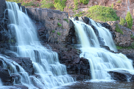 landscape photography of waterfalls by day thumbnail