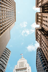 low angle photography of building at daytime thumbnail