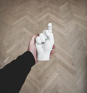 person holding white hand ceramic decor thumbnail