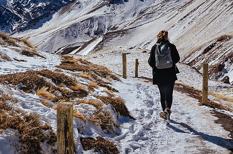 woman walking on road thumbnail