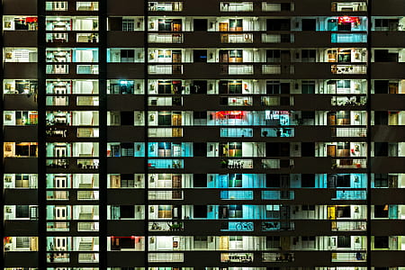 white concrete building with lights thumbnail