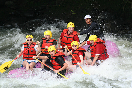 people riding on towable tube thumbnail