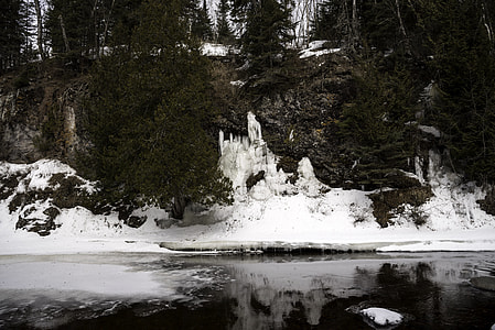 Icicles forming on the banks at Cascade River State Park, Minnesota thumbnail