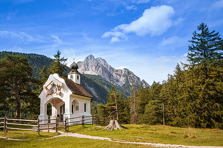 photo of chapel with mountains background thumbnail
