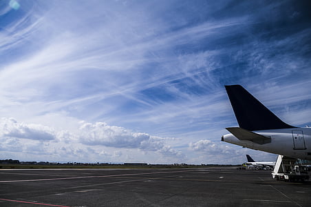 white airplane during daytime thumbnail