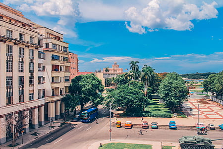 aerial view photography of person walking under cloudy blue sky during daytime thumbnail