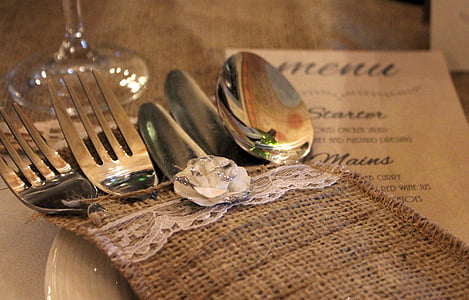 gray spoon, fork, and knife ins brown cloth thumbnail