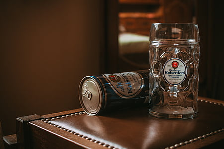cut crystal glass beer mug beside beer can thumbnail