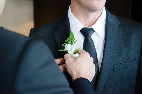 man's wearing black suit jacket thumbnail