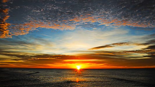 sea under white clouds at daytime thumbnail