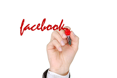 person  writing facebook using red pen thumbnail