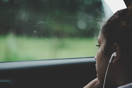 girl sitting inside car thumbnail