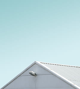 white galvanized iron sheet house roof during daytime thumbnail