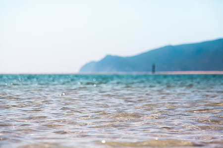 body of water across mountain thumbnail