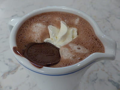 white ceramic mug with chocolate and cream thumbnail