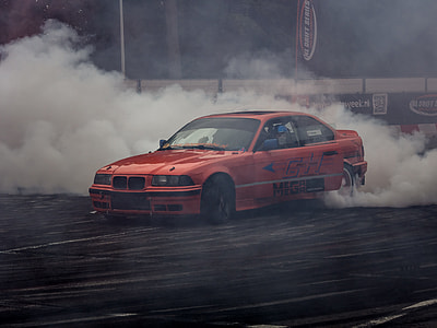 red BMW 3 series E36 coupe drifting thumbnail