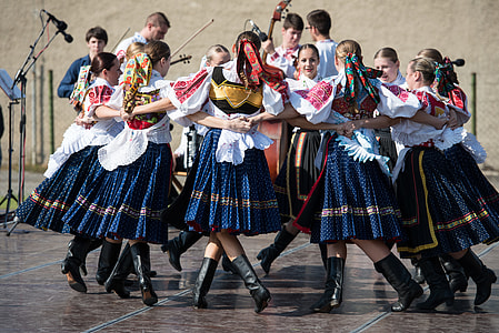 girls holding dance forming circle while dancing thumbnail